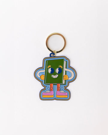 enamel keychain with green book man with arms, face and legs