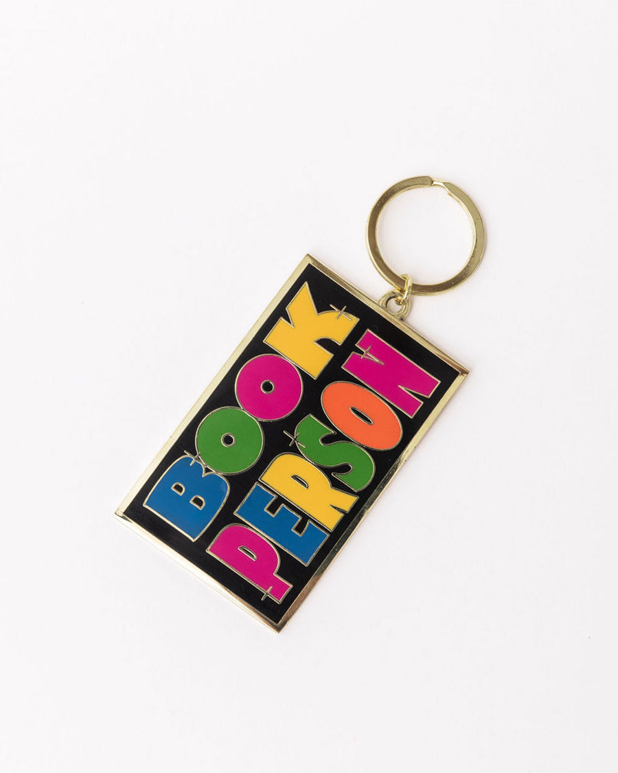Enamel Keychain Book Person –