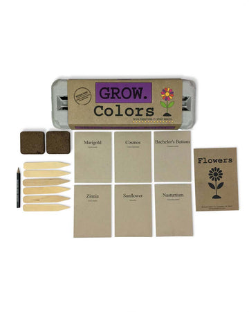 colorful grow kit with 6 packs of seeds, wooden stakes, pencil, egg carton and soil 