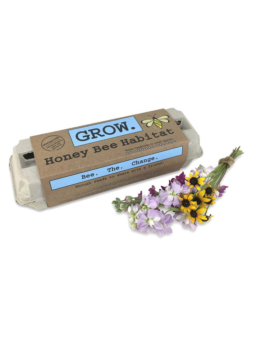 packaged honey bee habitat grow kit with seeds, wooden stakes, pencil, egg carton and soil