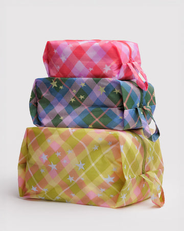 set of 3 3d zip pouches: pink plaid star, green/blue plaid star, and yellow plaid star