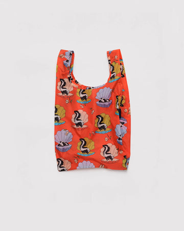 coral baby baggu with a skunk in a seashell print