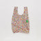beige baby baggu with all over hello kitty and fruit and veggie prints