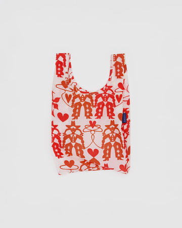 cream baby baggu with red cowgirl print