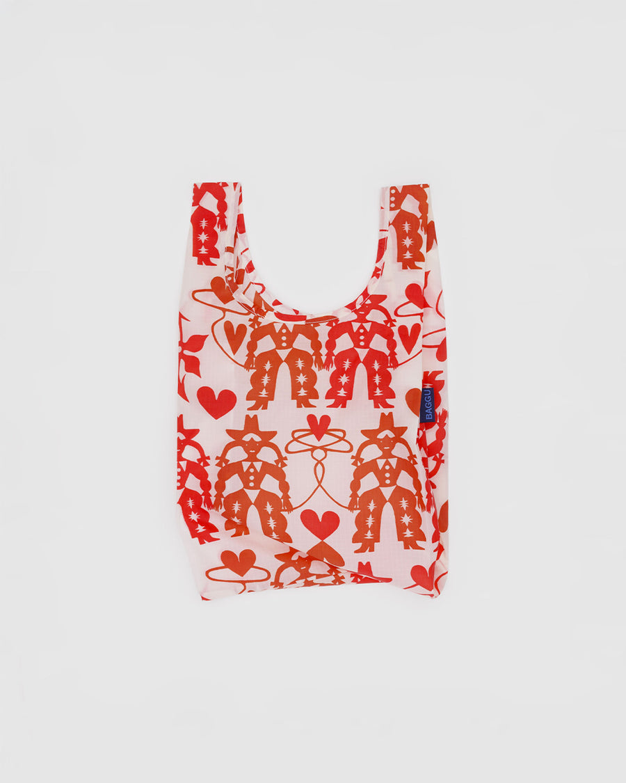 cream baby baggu with red cowgirl print