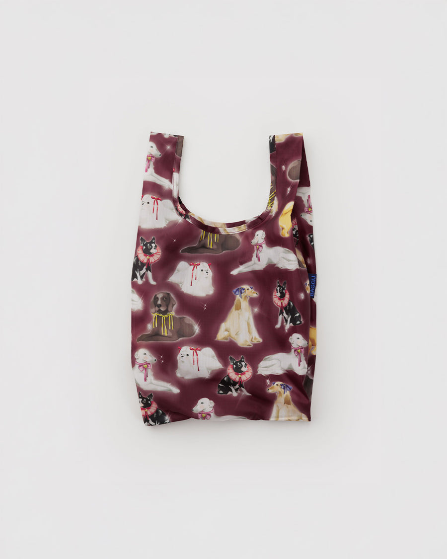 maroon baby baggu with various dogs with ribbons tied around their necks