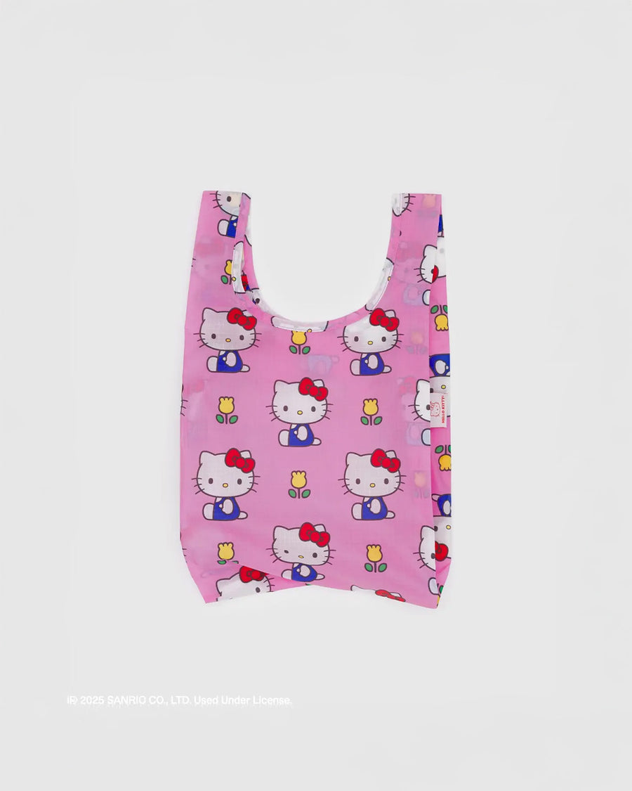 pink baby baggu with hello kitty and yellow tulip print