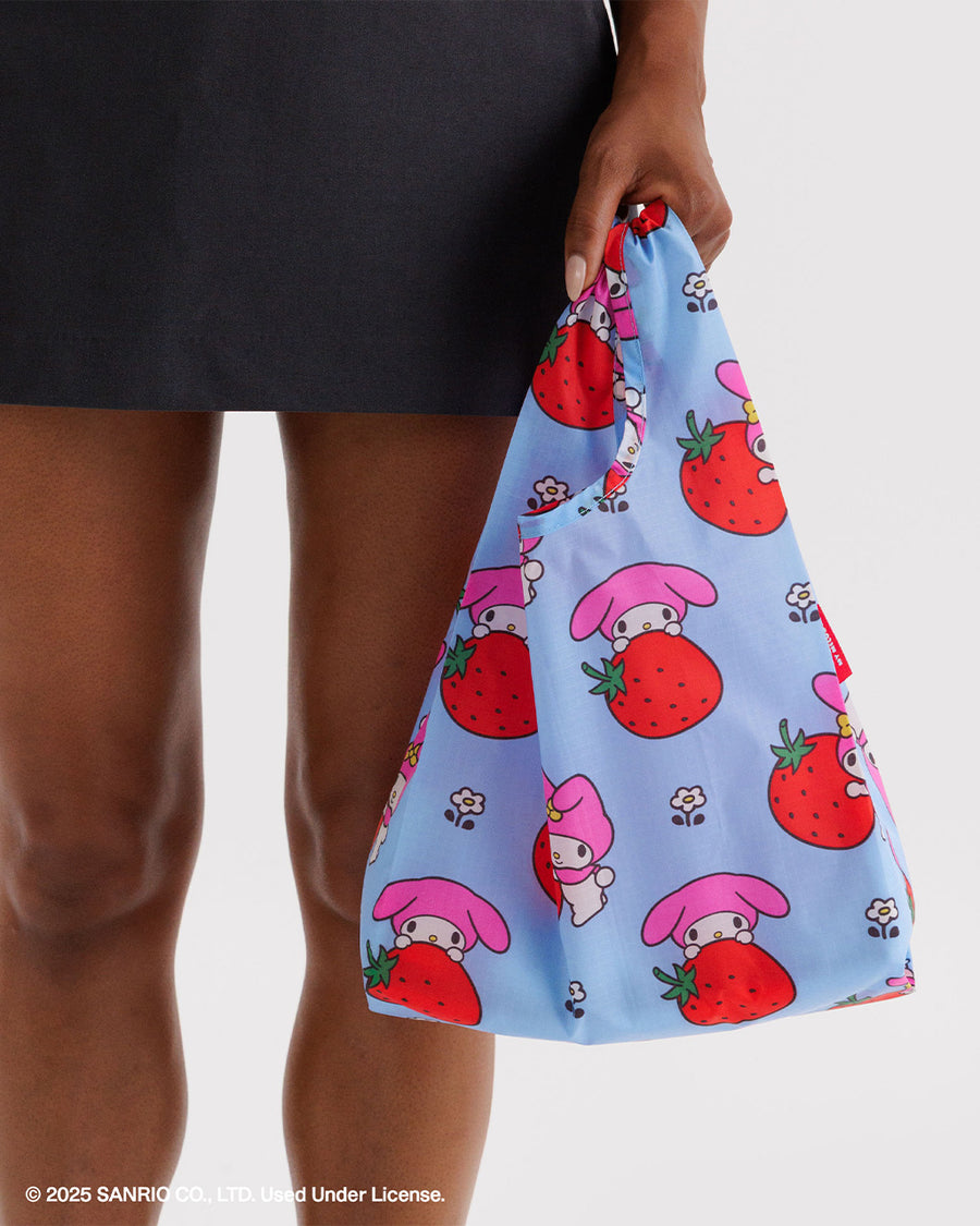 model carrying periwinkle baby baggu with my melody and strawberry print