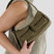 model wearing small seaweed cargo baguette bag