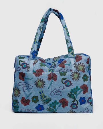 blue digital denim nylon cloud carry on bag with colorful floral and bird print