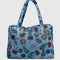 blue digital denim nylon cloud carry on bag with colorful floral and bird print