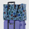 blue digital denim nylon cloud carry on bag with colorful floral and bird print on suitcase