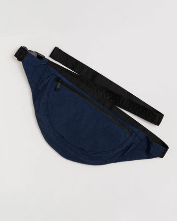 navy crescent shaped fanny pack with black strap