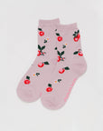 light pink socks with apple needlepoint print