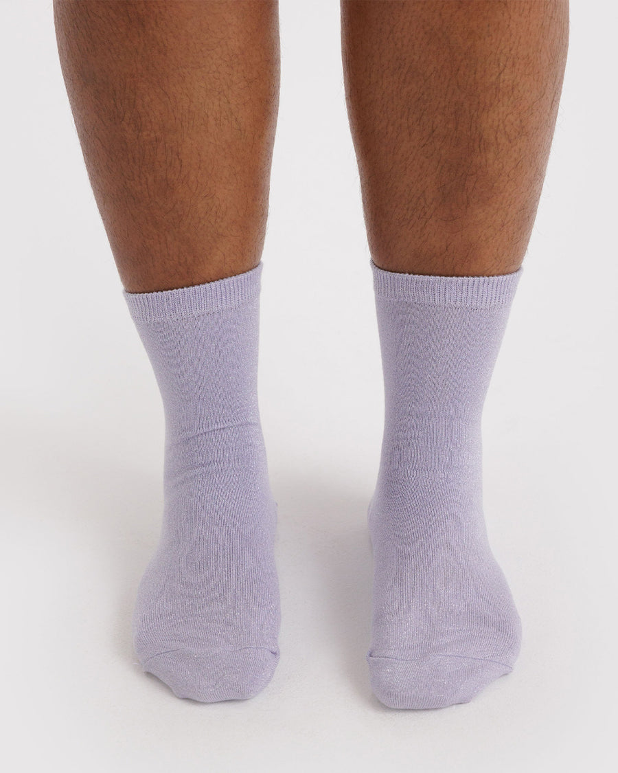 model wearing metallic lilac crew socks