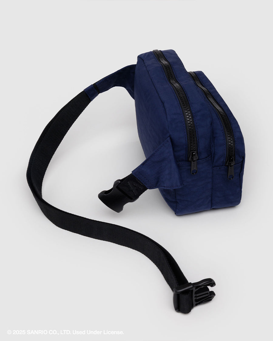 side view of clip on navy fanny pack with embroidered hello kitty with a milkshake and fishbowl