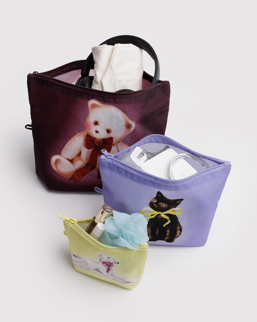 set of 3 go pouch: small yellow fancy dog, lilac fancy cat, and large mahogany fancy teddy bear with items inside