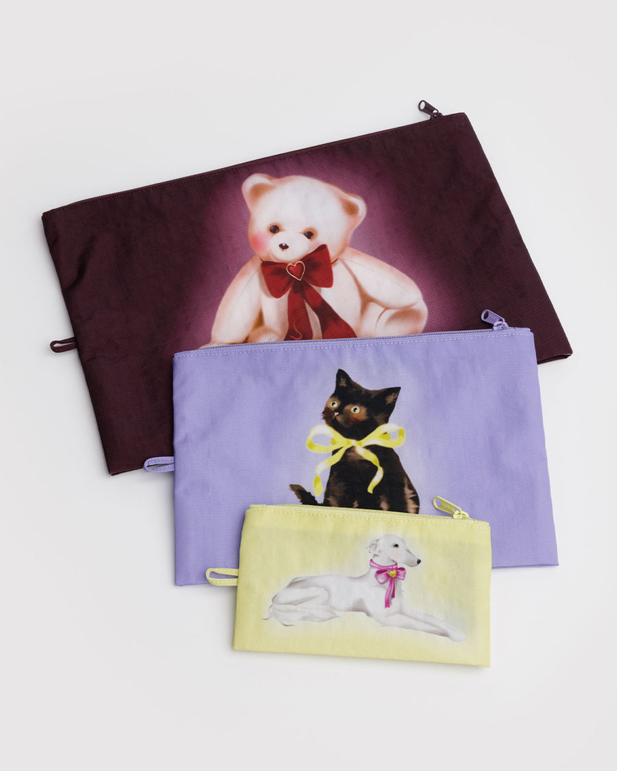 flattened set of 3 go pouch: small yellow fancy dog, lilac fancy cat, and large mahogany fancy teddy bear