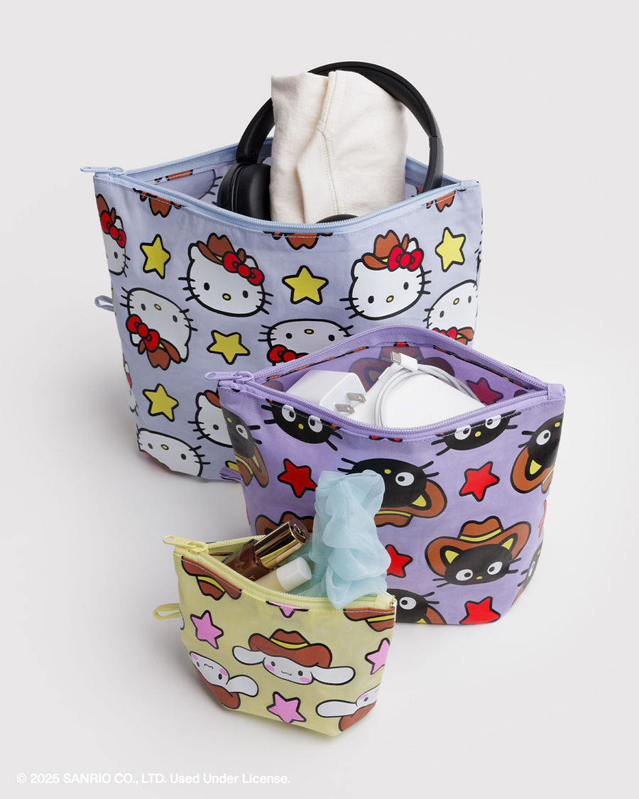 set of 3 go pouch: small yellow western bunny, lilac medium western black cat, and blue large western hello kitty with items inside