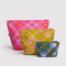 set of 3 go pouch: small blue/green plaid star, medium yellow plaid star, and large pink plaid star