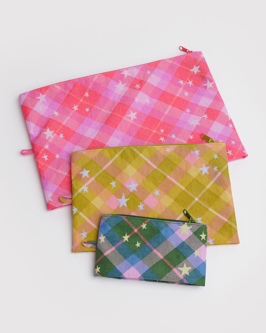flattened set of 3 go pouch: small blue/green plaid star, medium yellow plaid star, and large pink plaid star