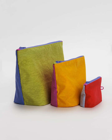 set of 3 go pouch set: green/periwinkle, orange/pink, and light blue/red