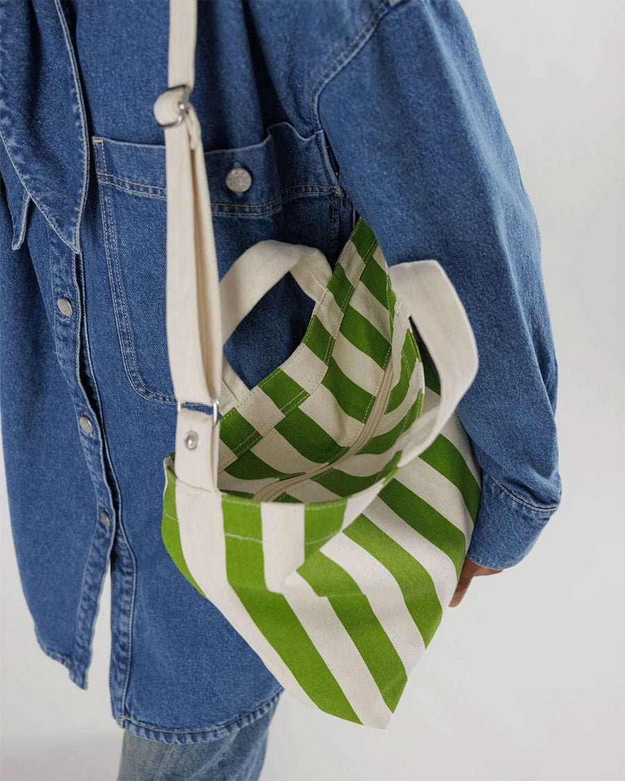 top zipper of green and cream vertical stripe horizontal zip duck bag