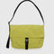 lemongrass nylon messenger bag with black front buckle