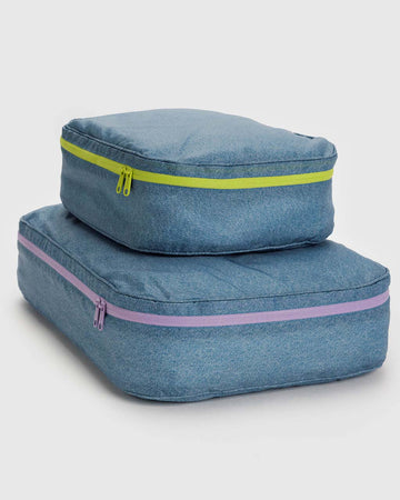 set of two large packing cubes in digital denim print with neon zippers