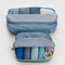 set of two large packing cubes in digital denim print with neon zippers filled with jeans