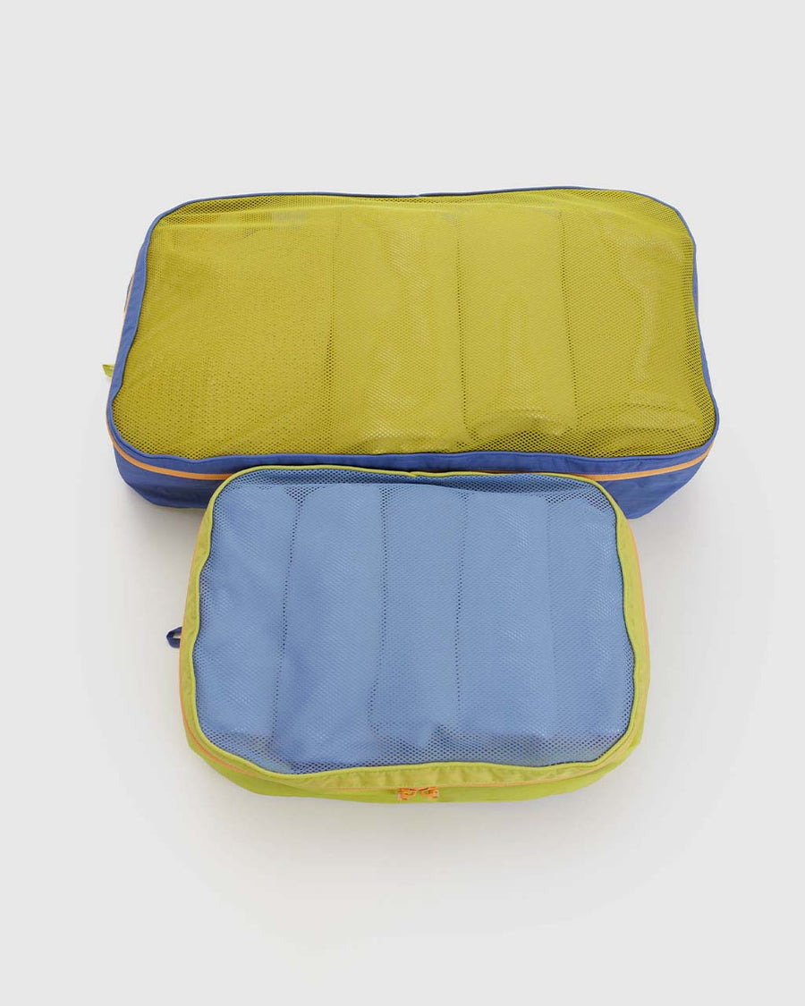 front view of set of 2 large packing cubes: periwinkle and lime green and green mesh with royal blue