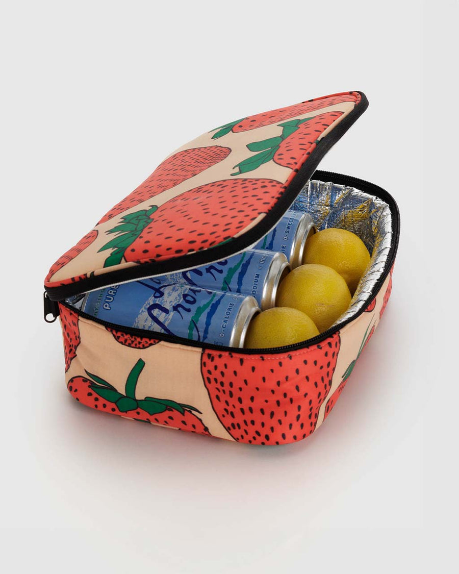 strawberry lunch box with la croix and lemons inside