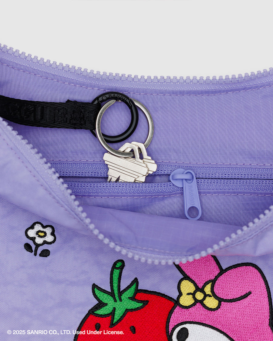 black key leash in lavender medium nylon crescent bag with embroidered my melody hugging a strawberry and white flower print