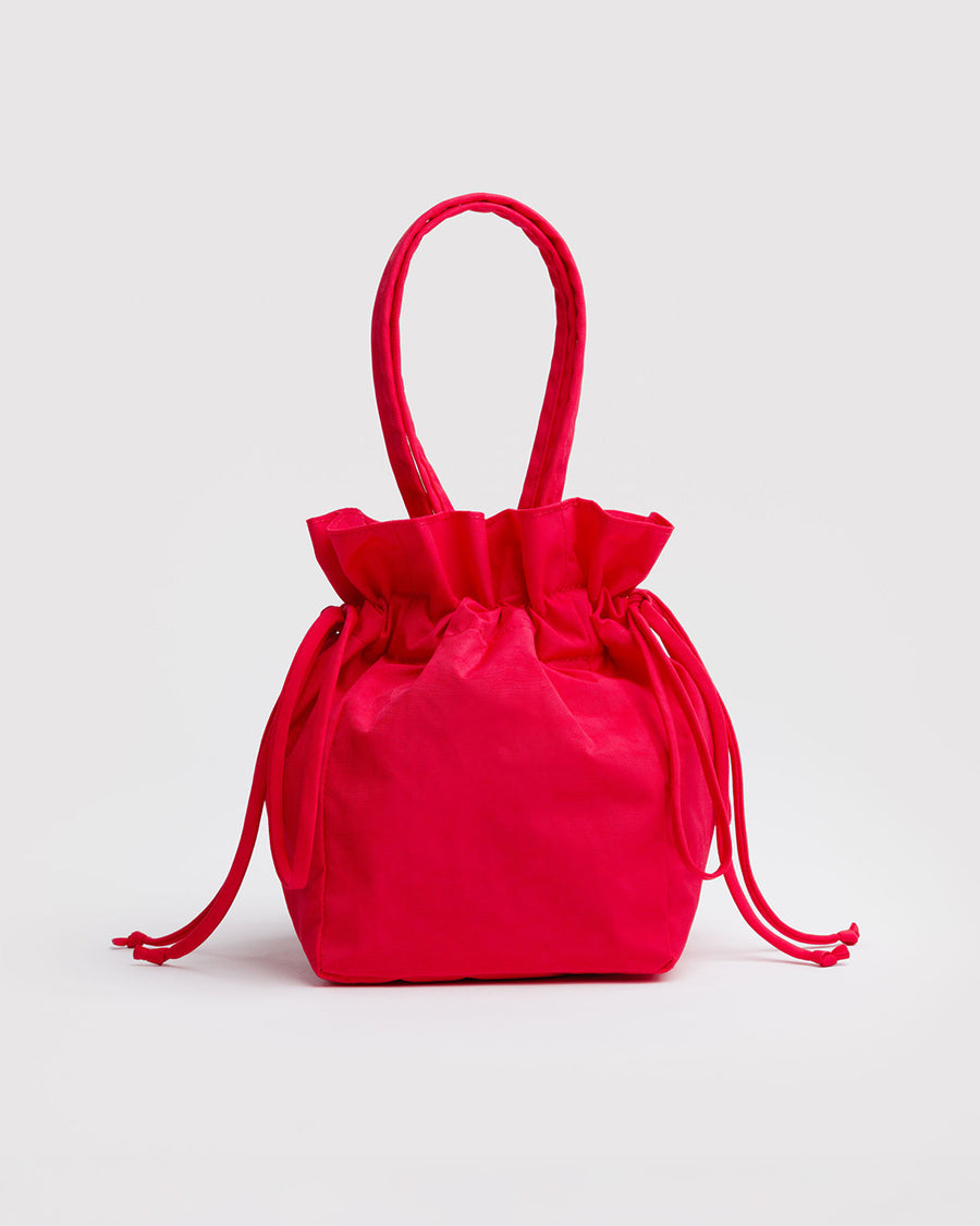 red drawstring bag with handle