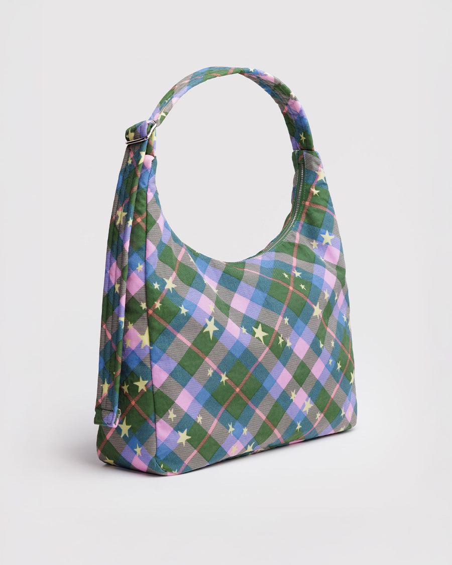 side view of green and pink plaid star nylon shoulder bag