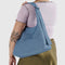 model carrying digital denim nylon shoulder bag