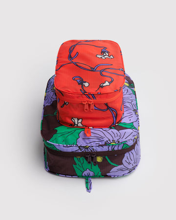 set of two packing cubes: small coral snapdragon and large maroon poppy