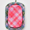 flattened set of two packing cubes: small pink plaid star and large blue/green plaid star