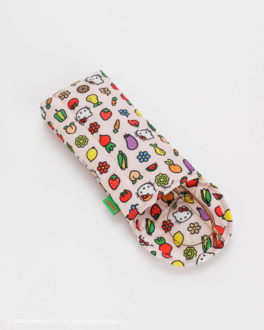 blush puffy eyeglass case with hello kitty and fruit and veggies icons with glasses inside