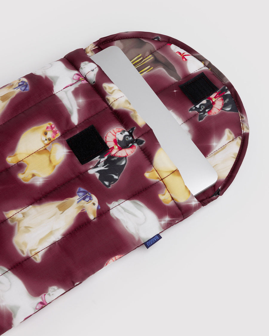 maroon 13 in. puffy laptop sleeve with fancy dogs print with laptop inside
