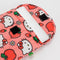 un-velcroed pink 13 in. puffy laptop sleeve with hello kitty face, apple and strawberry print