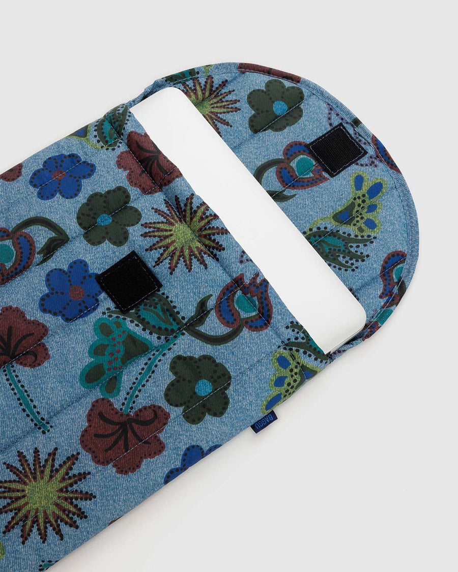 digital denim 16 in. laptop sleeve with colorful floral and bird print with laptop inside