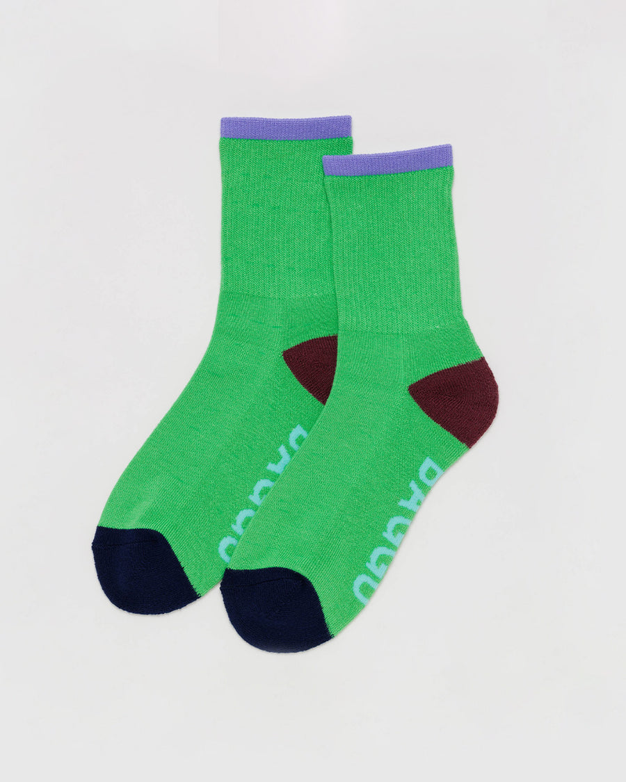 bright green ribbed crew socks with periwinkle, brown and black accents