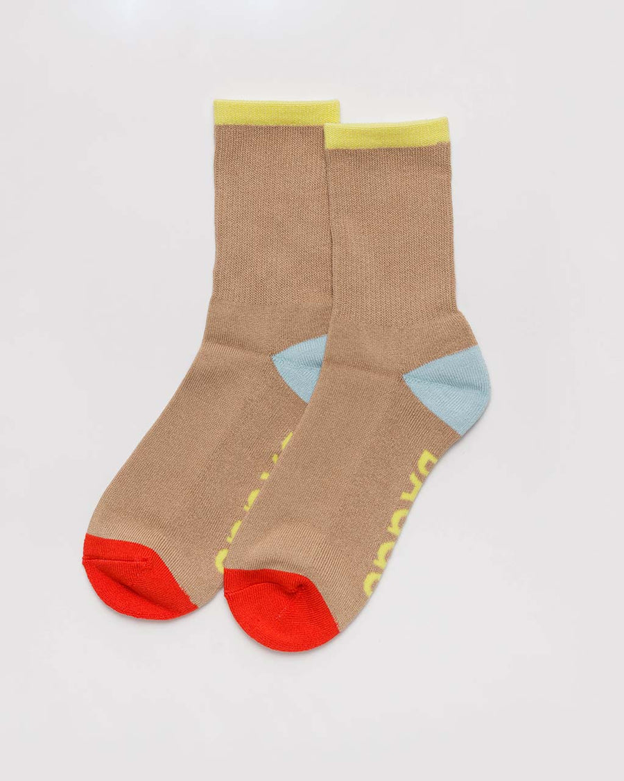 beige ribbed socks with yellow, blue and red accents