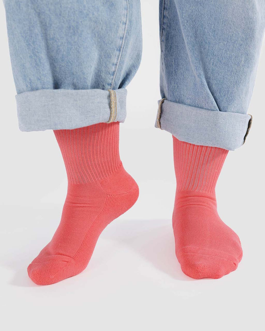model wearing watermelon pink ribbed socks