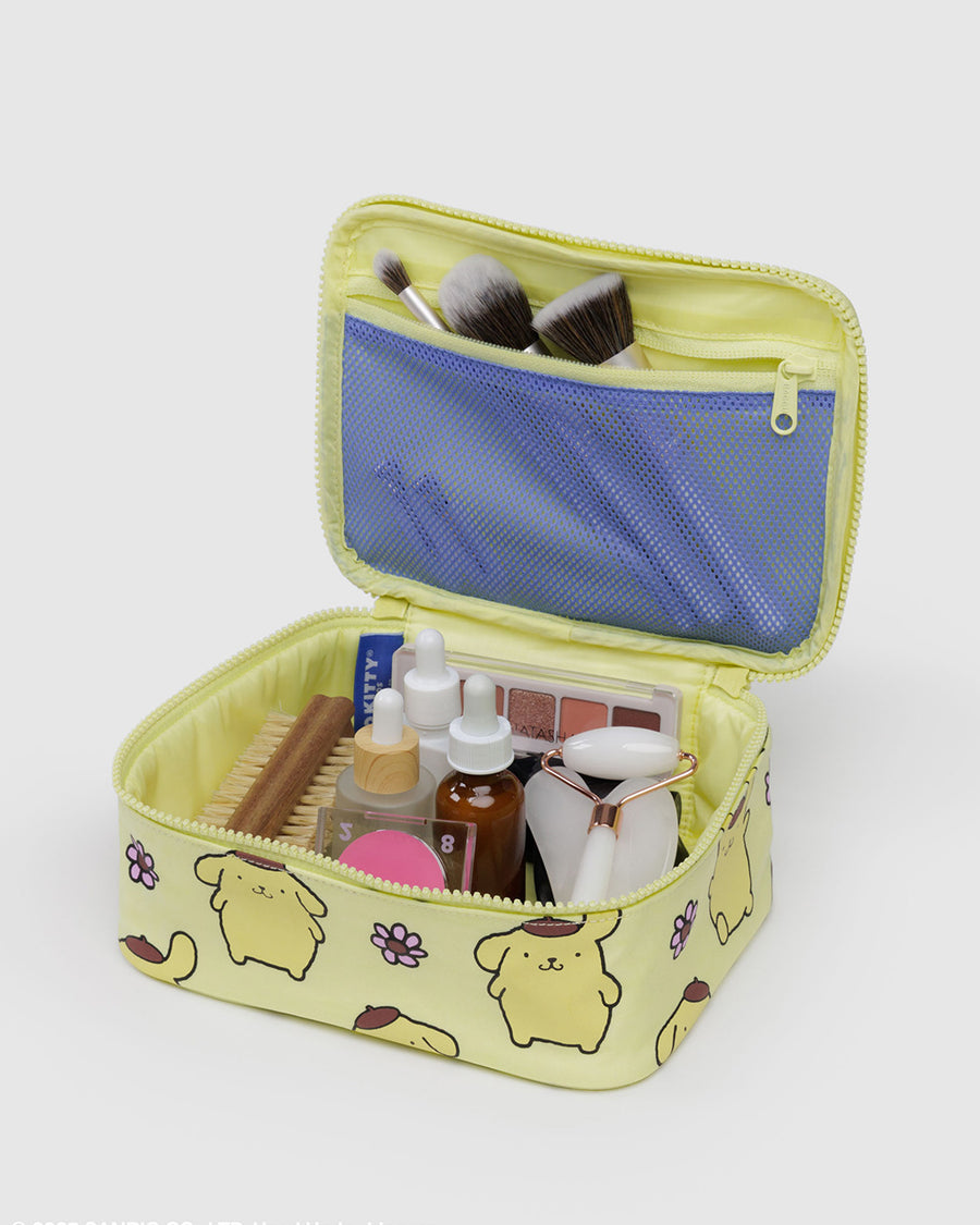 lavender interior pocket of yellow pompompurin and purple flower small cosmetic bag with makeup inside