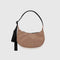 light brown small nylon crescent bag