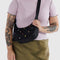 model wearing black colorful embroidered hearts small nylon crescent bag