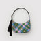 pink, green and blue plaid small crescent bag with black adjustable strap