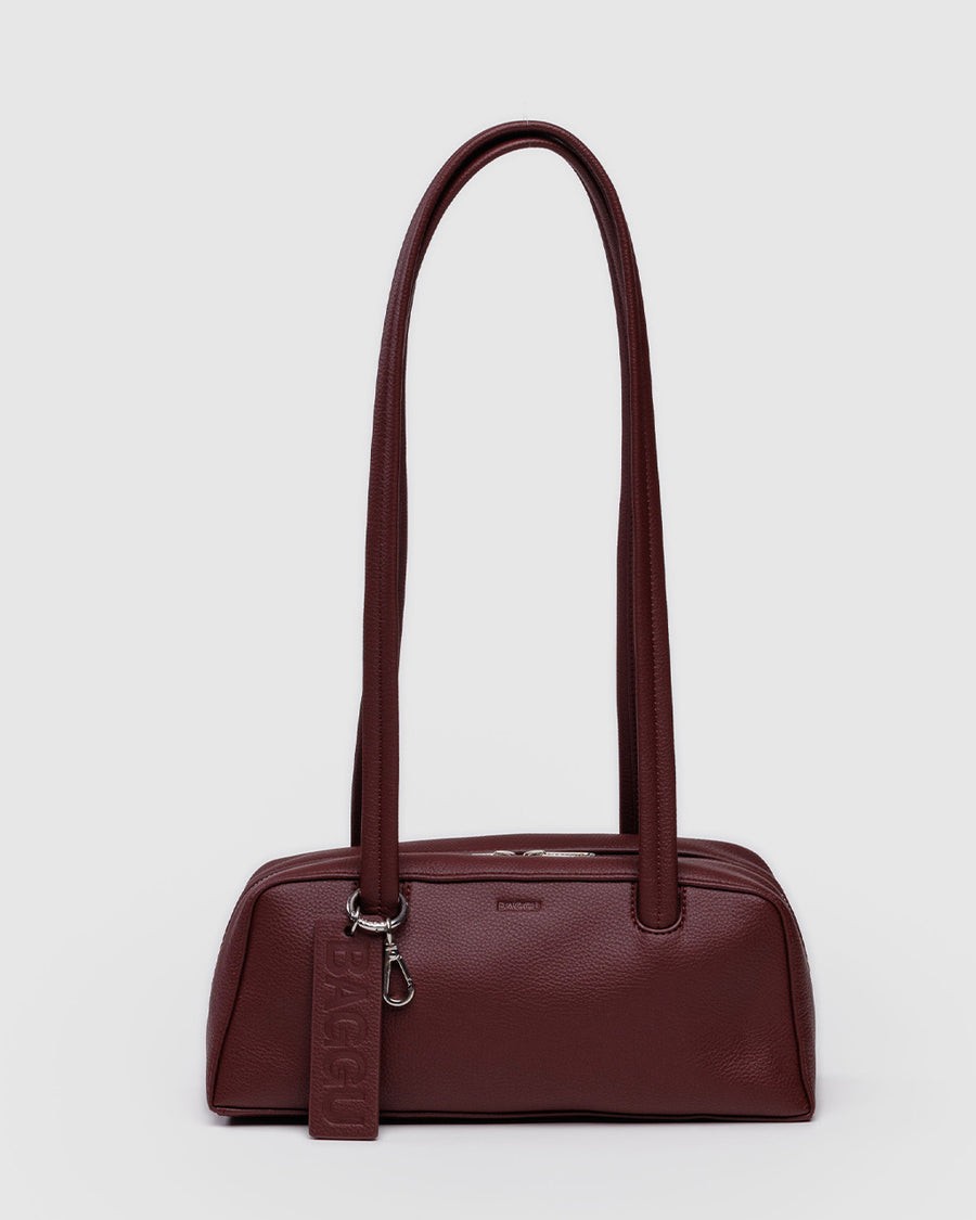 mahogany small dome recycled leather bowler bag with silver charm clasp